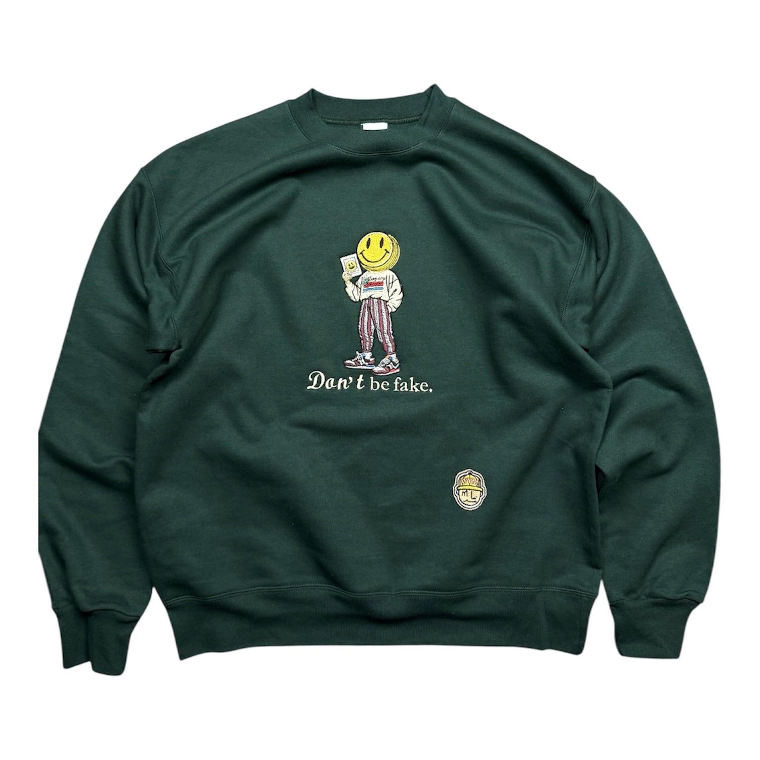 Green sweatshirt with a graphic design and text on a white background